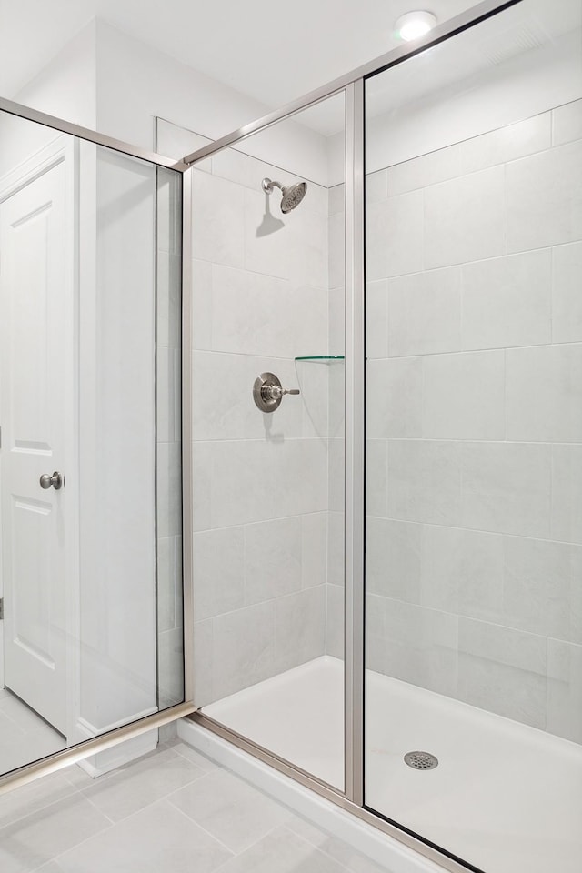 bathroom featuring a stall shower