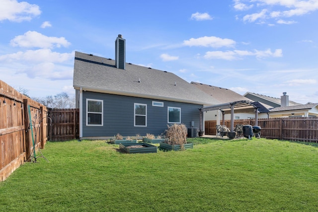 rear view of house with a fenced backyard, a vegetable garden, a lawn, and a pergola