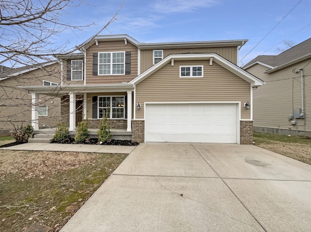 view of front of house featuring covered porch, driveway, and brick siding