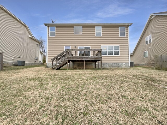 back of house with central AC, stairway, a lawn, and a wooden deck