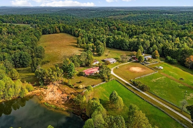 aerial view with a water view and a view of trees