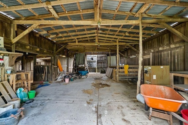 miscellaneous room with lofted ceiling