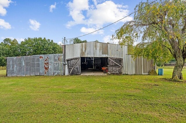 view of outbuilding featuring an outdoor structure