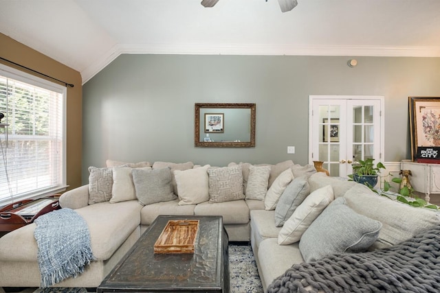 living area featuring ornamental molding, french doors, vaulted ceiling, and a ceiling fan