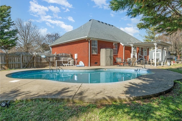 view of pool with a patio, fence, a fenced in pool, and a pergola