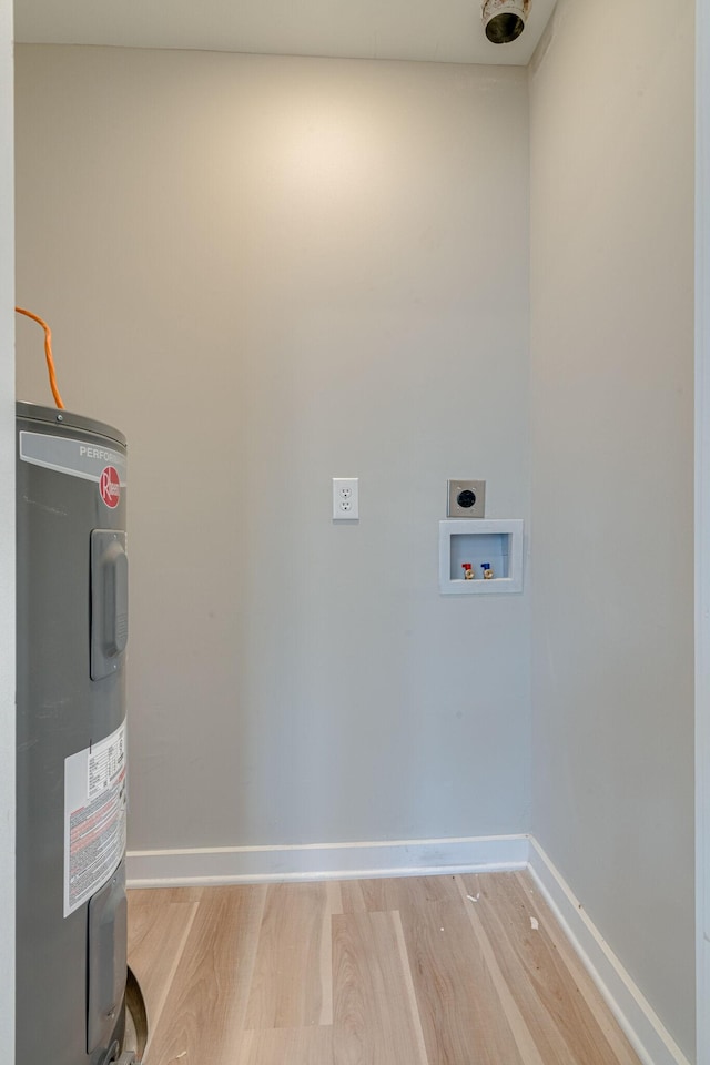 utility room with electric water heater