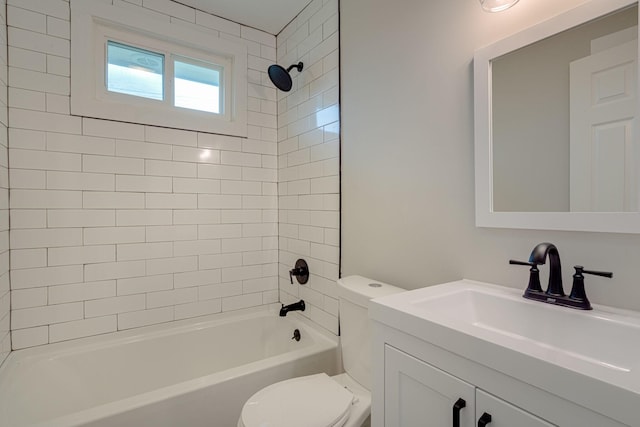 bathroom with shower / washtub combination, vanity, and toilet