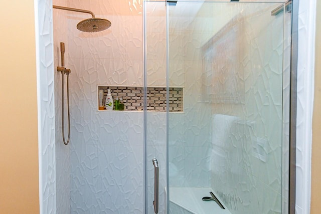 bathroom with a stall shower