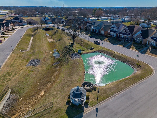 aerial view with a water view and a residential view