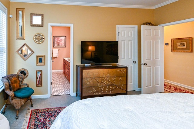 bedroom featuring baseboards, carpet, connected bathroom, and crown molding