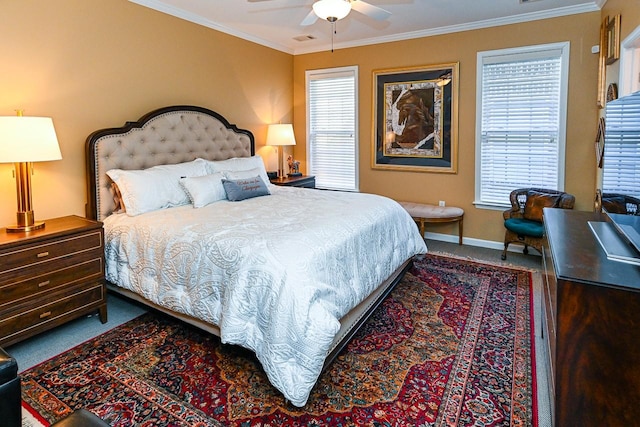 bedroom featuring ornamental molding, multiple windows, and baseboards