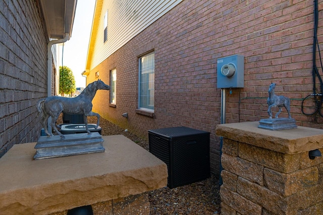 view of property exterior featuring brick siding