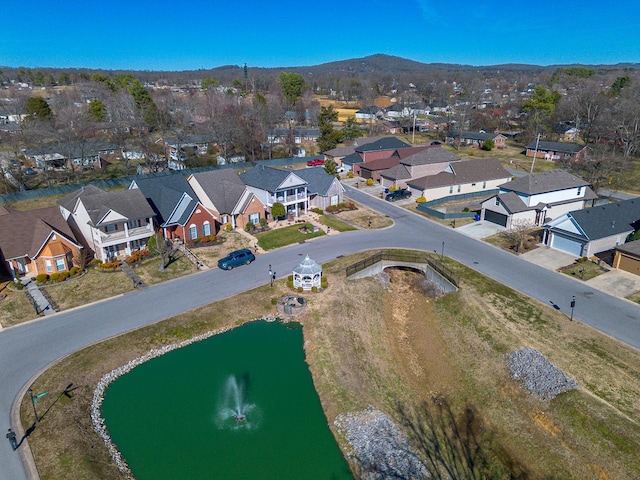 aerial view featuring a residential view and a water and mountain view