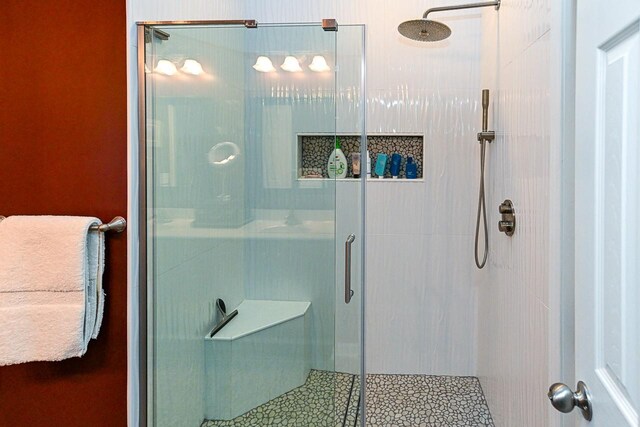 bathroom featuring a stall shower