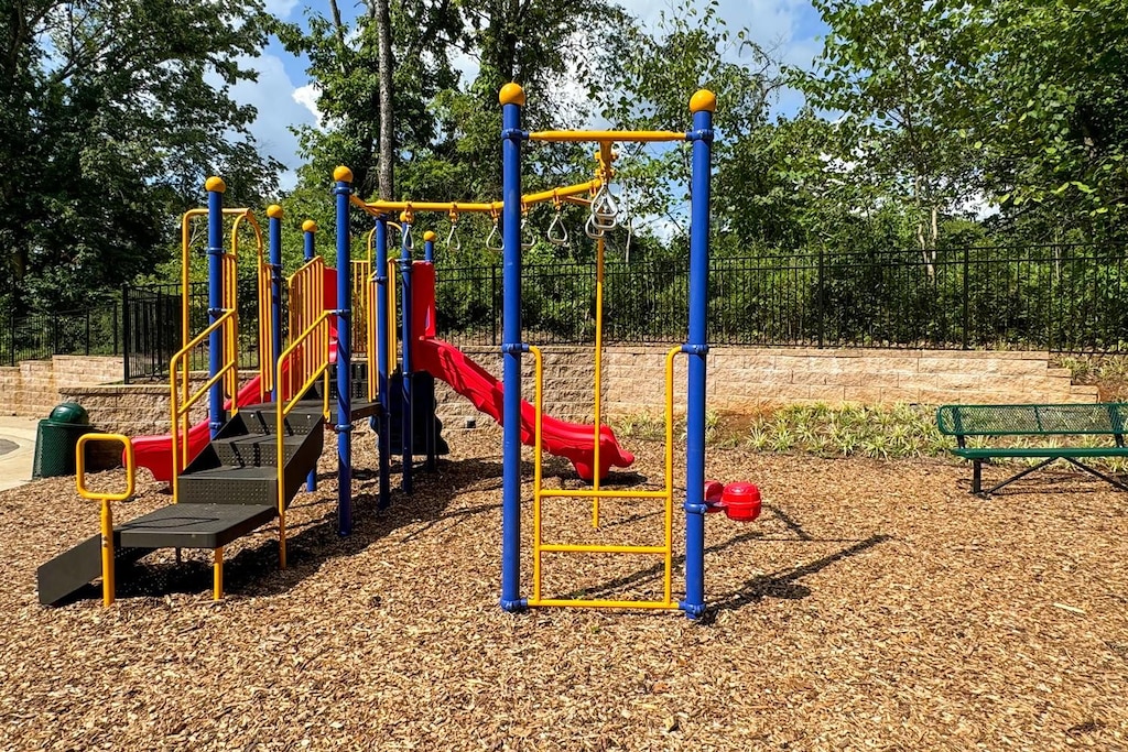 community play area featuring fence