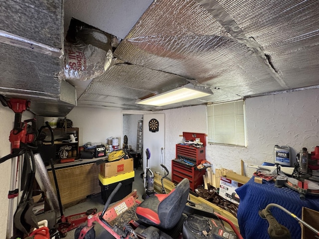 garage featuring a textured wall