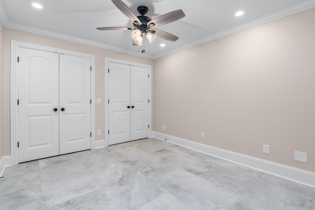 unfurnished bedroom featuring baseboards, a ceiling fan, crown molding, multiple closets, and recessed lighting