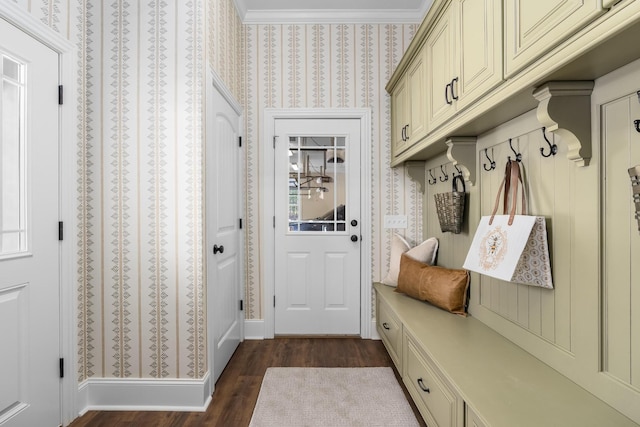 mudroom featuring dark wood-type flooring, baseboards, and wallpapered walls