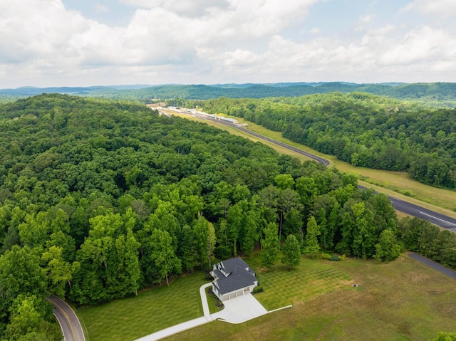 aerial view featuring a forest view