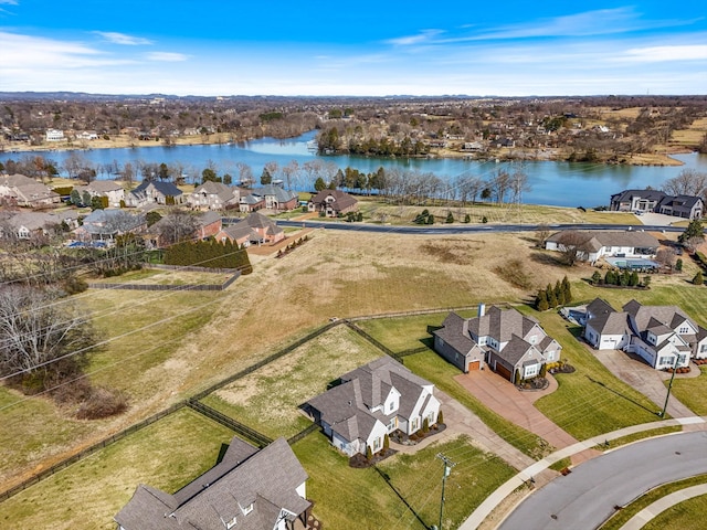 aerial view with a water view and a residential view