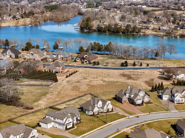 aerial view featuring a residential view and a water view