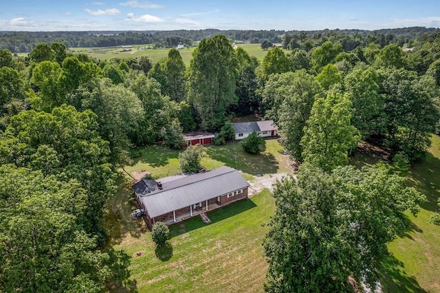 drone / aerial view with a view of trees