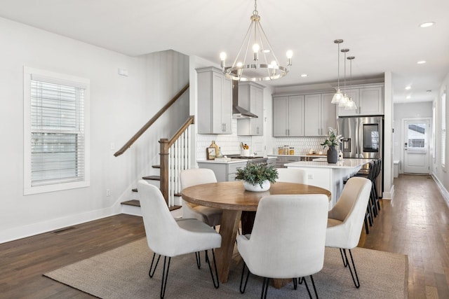 dining room with recessed lighting, dark wood-style flooring, visible vents, baseboards, and stairs