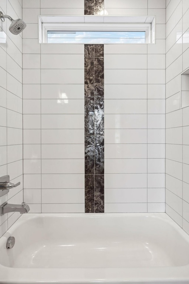 bathroom with shower / bathtub combination