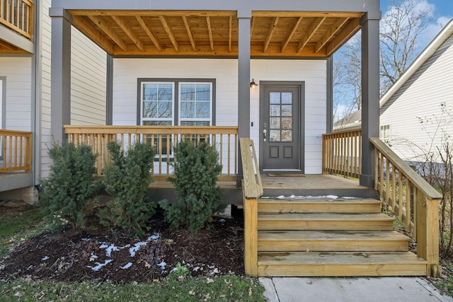 property entrance with a porch