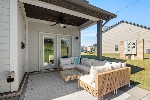 view of patio / terrace featuring outdoor lounge area, ceiling fan, and central AC