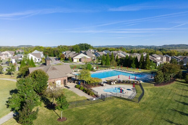 birds eye view of property with a residential view