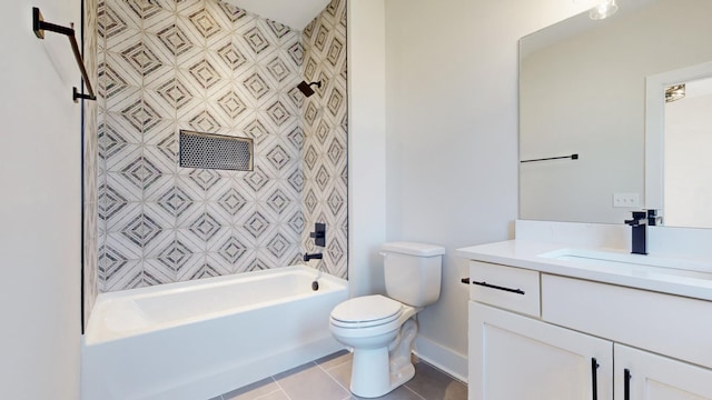 bathroom with toilet, vanity, tile patterned flooring, and washtub / shower combination