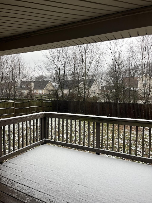 wooden deck featuring a fenced backyard