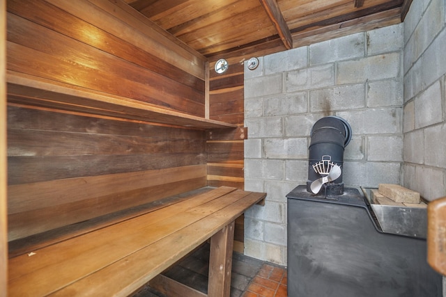 view of sauna / steam room with concrete block wall