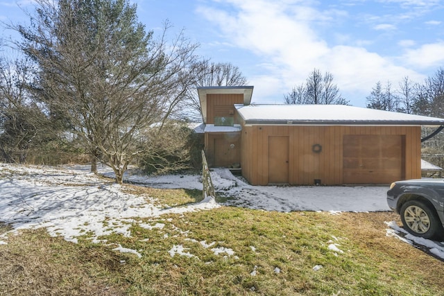 exterior space featuring an attached garage