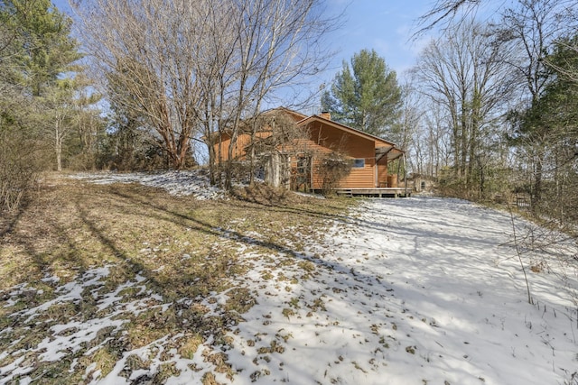 view of snow covered property