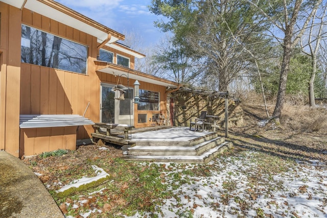 exterior space featuring a wooden deck