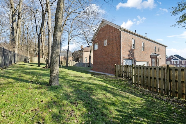 view of yard featuring a fenced backyard