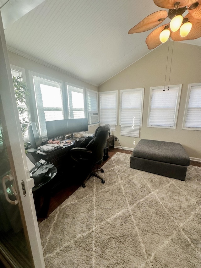 office space with lofted ceiling, cooling unit, and baseboards