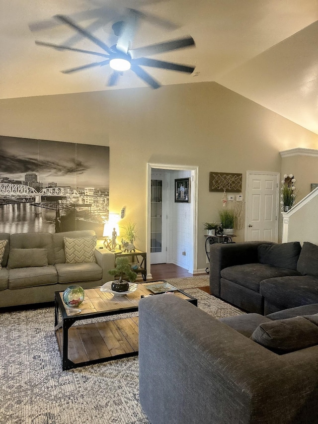 living room with vaulted ceiling and a ceiling fan
