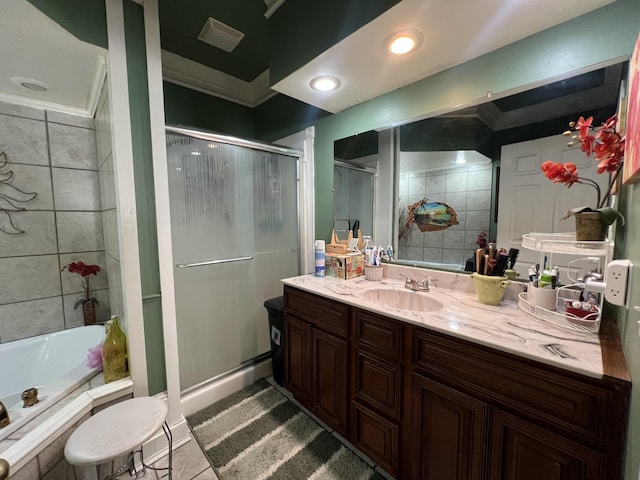 bathroom with a garden tub, tile patterned flooring, visible vents, vanity, and a shower stall