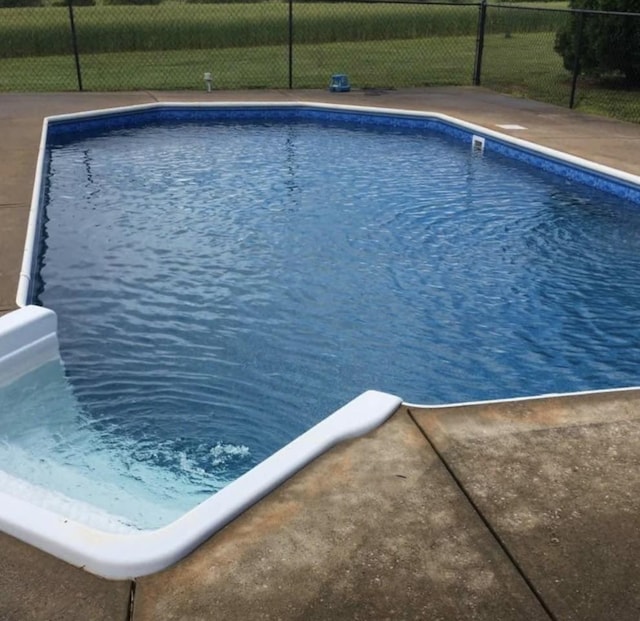 view of pool featuring fence and a fenced in pool