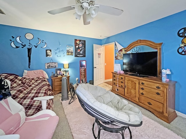 325 Davis Mill Rd, Elkton, KY 42220 - carpeted living room with a ceiling fan and baseboards
