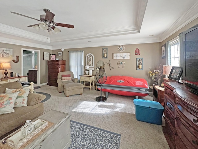 325 Davis Mill Rd, Elkton, KY 42220 - carpeted living area with a tray ceiling, crown molding, and a ceiling fan