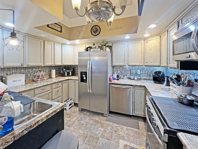 325 Davis Mill Rd, Elkton, KY 42220 - kitchen featuring appliances with stainless steel finishes, tasteful backsplash, hanging light fixtures, recessed lighting, and crown molding