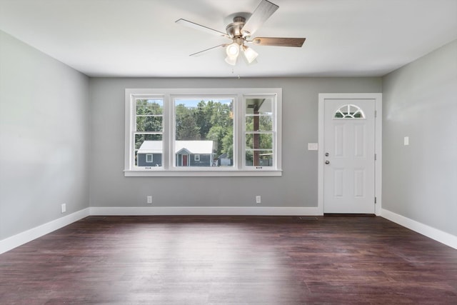 entrance foyer featuring ceiling fan, baseboards, and dark wood finished floors