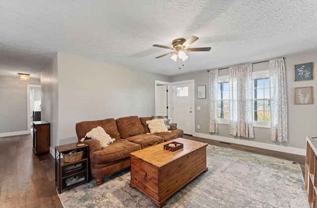 224 Kempville Hwy, Carthage, TN 37030 - living area with wood finished floors, a ceiling fan, and baseboards