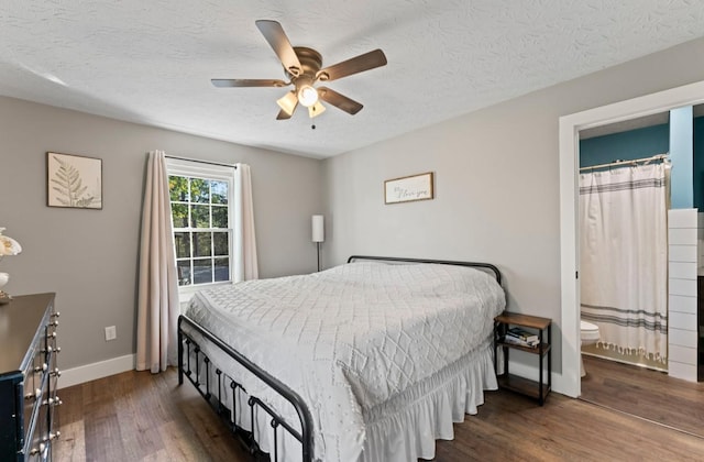 224 Kempville Hwy, Carthage, TN 37030 - bedroom with dark wood-style floors, ceiling fan, baseboards, and a textured ceiling