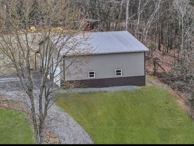 224 Kempville Hwy, Carthage, TN 37030 - view of side of property featuring metal roof and a yard