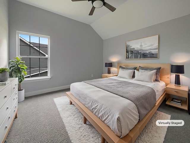 bedroom featuring vaulted ceiling, ceiling fan, light carpet, and baseboards